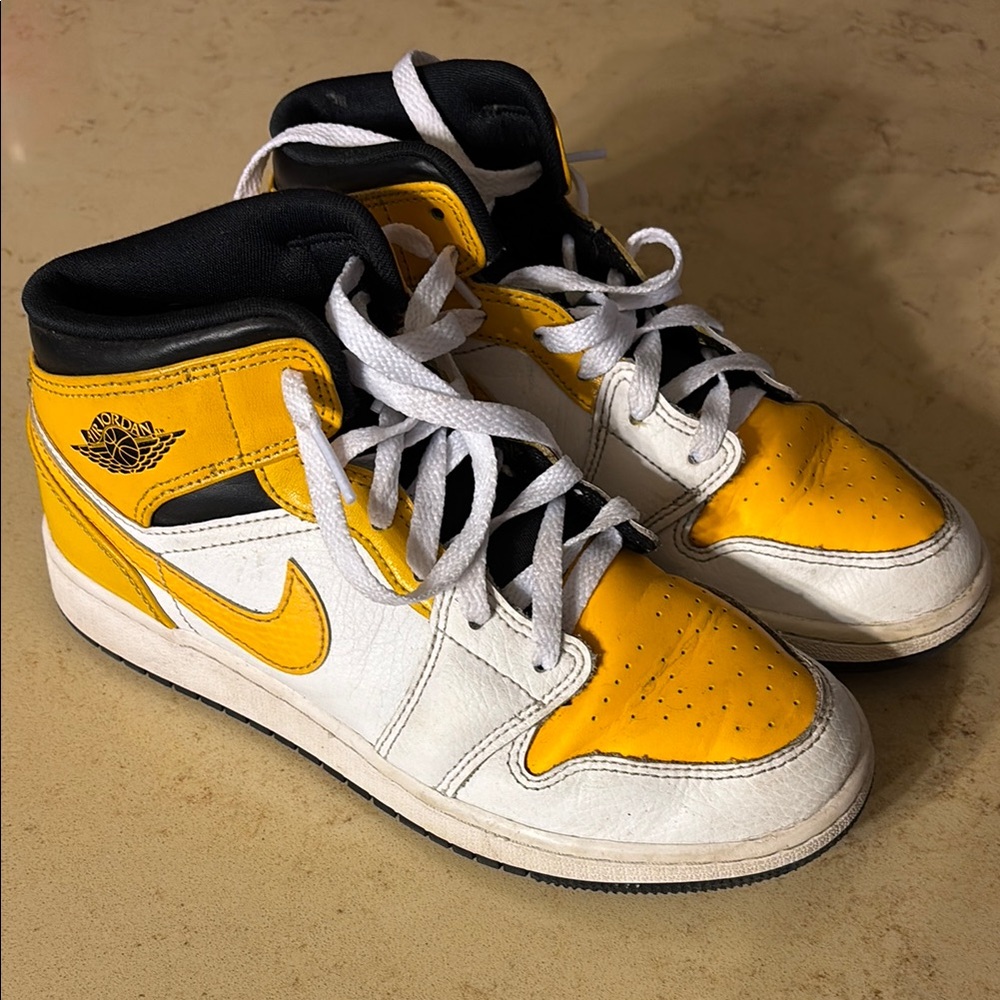 Nike Black, Yellow, and White High-Top Sneakers